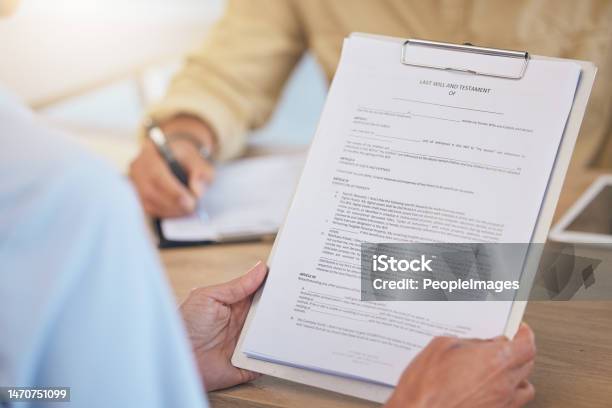 Contract Last Will And Testament With Life Insurance Legal Document And Clipboard In Hands With Agreement Compliance With Safety And Security In Retirement Or Death Reading And Sign Paperwork Stock Photo - Download Image Now