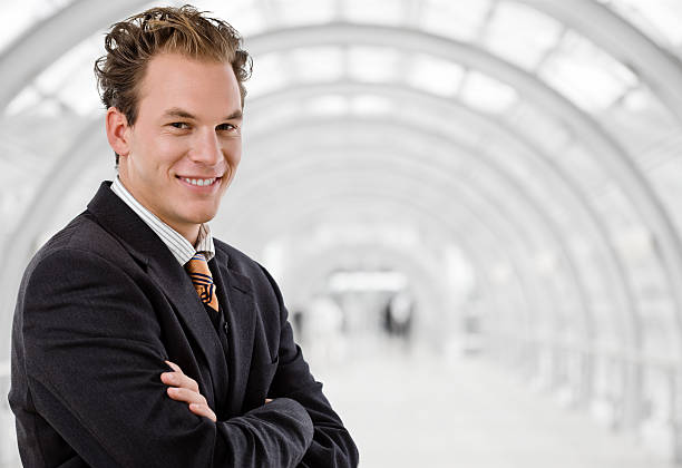 istock Happy businessman smiling 147075129