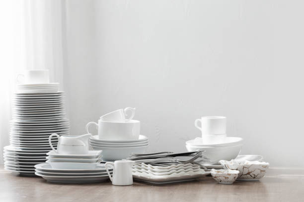 istock various cutlery on a wooden table against a white wall 1470753232