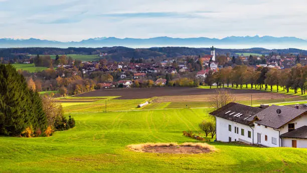 Autumn landscape - view of the town of Ebersberg and its surroundings against the backdrop of the Alps, Bavaria, Germany