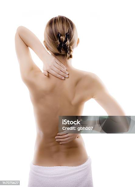 Woman Massaging Pain Back Stock Photo - Download Image Now - Women, Backache, Back