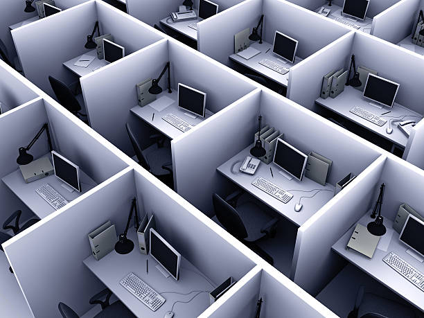 Aerial view of identical cubicles with desktop computers