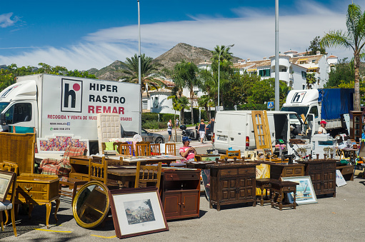 BENALMADENA, COSTA DEL SOL, PROVINCE OF MALAGA, SPAIN - September 14, 2016: Old furniture and paintings on a local swap meet.