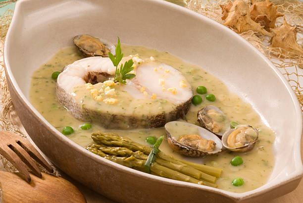 Spanish cuisine. Hake Basque style. stock photo