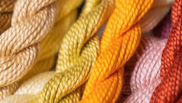 istock Sewing thread for embroidery close-up, twisted into bundles. Hobby, handmade, embroidery 1470762641