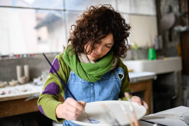 istock Ceramics pottery craft workshop: Dish decoration painting 1470762927