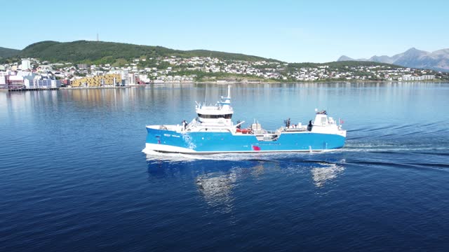 The salmon boat entering Harstad Harbour