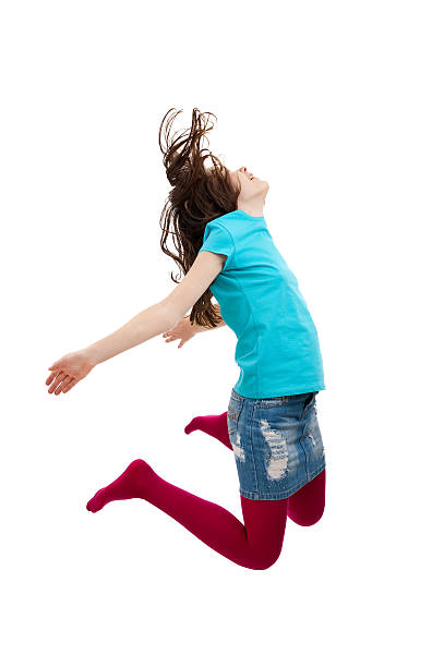 istock Girl jumping isolated on white background 147076840