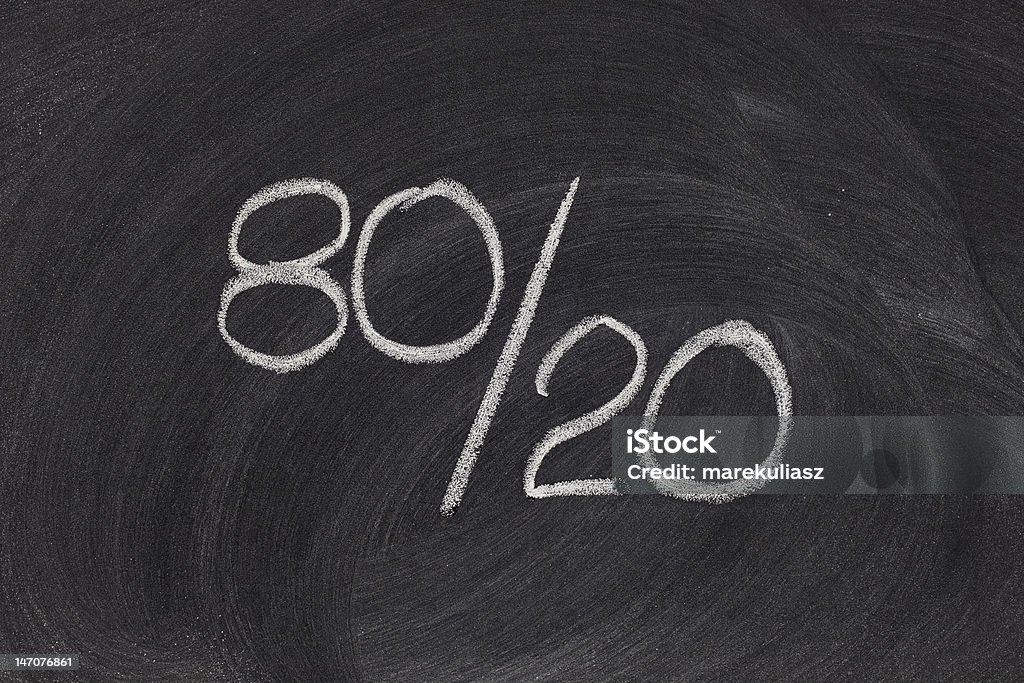 Pareto principle, eighty-twenty rule Pareto principle or eighty-twenty rule represented on a blackboard - white chalk handwriting Number 20 Stock Photo