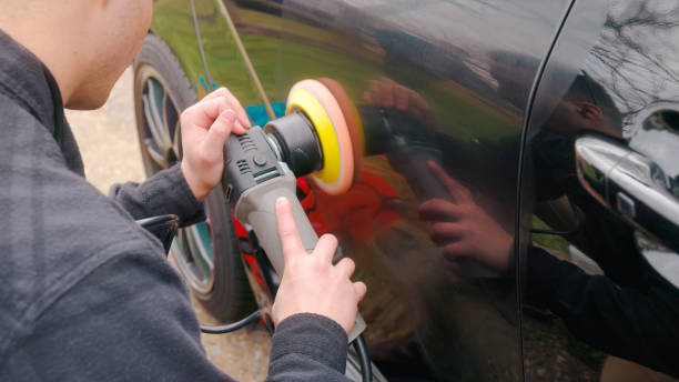 istock Paint Correction - Polishing Black Car Paint with Dual Action Polisher using Polishing Compound - Close Up 1470769643