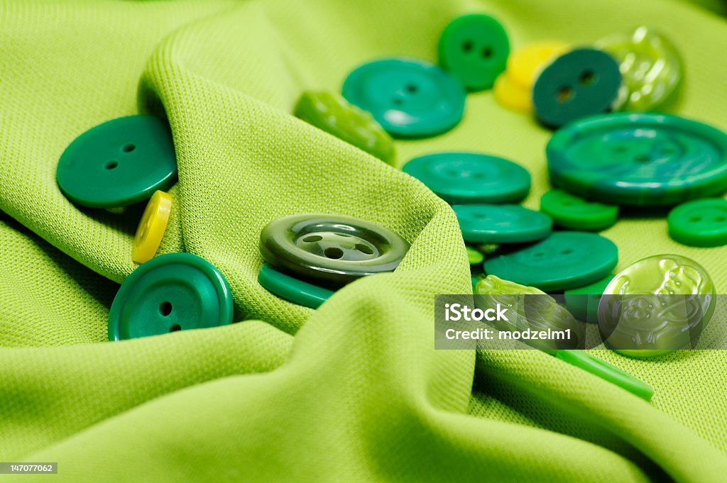 Buttons Green and Yellow Plastic Buttons Backgrounds Stock Photo