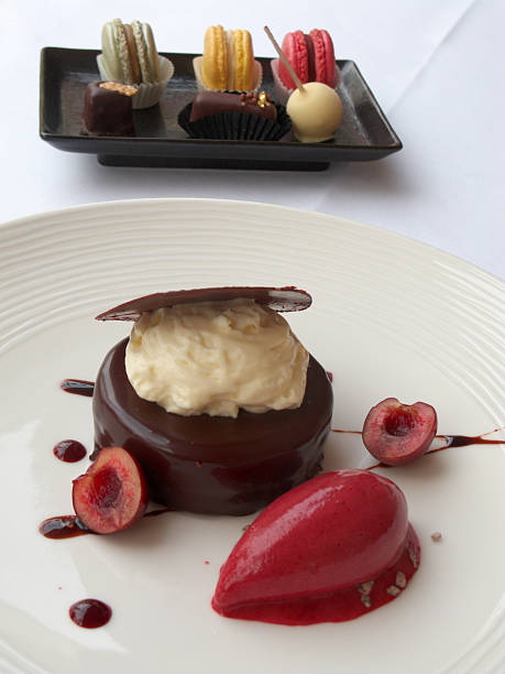 istock Chocolate dessert with cherry sorbet and artisan macaroon chocolates 147077205