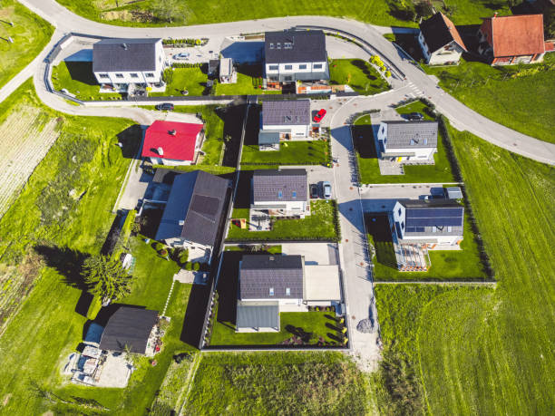 istock Arial view of newly developed housing community surrounded by green fields 1470773757