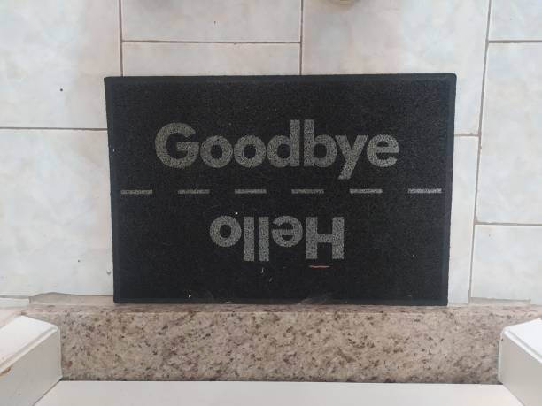 istock A doormat in which reads 'Hello' and 'Goodbye' 1470775427