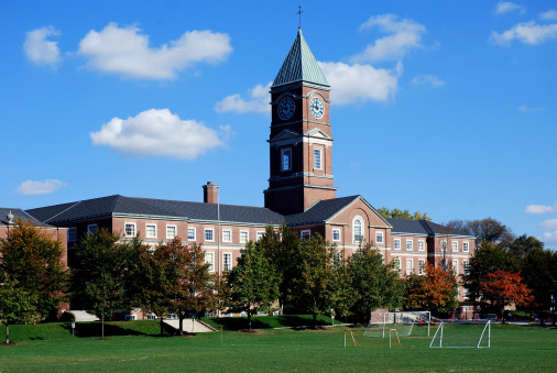 An old fashioned high school building with a clock tower.  It's Upper Canada College, an 