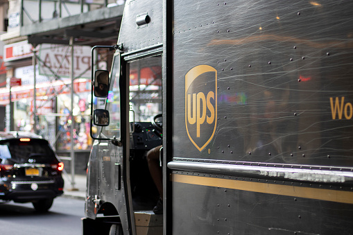 New York, NY, USA - July 7, 2022: A UPS delivery truck is seen on the streets in Midtown Manhattan, New York City.