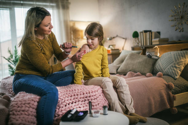 istock Diabetic girl taking an insulin in hers arm 1470776963