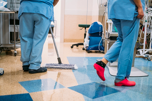 Concept photo of A hospital worker doing cleaning in operation room