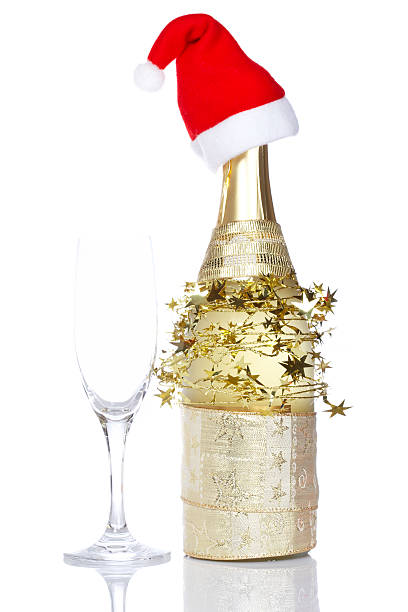 istock Champagne bottle with red christmas hat 147077797