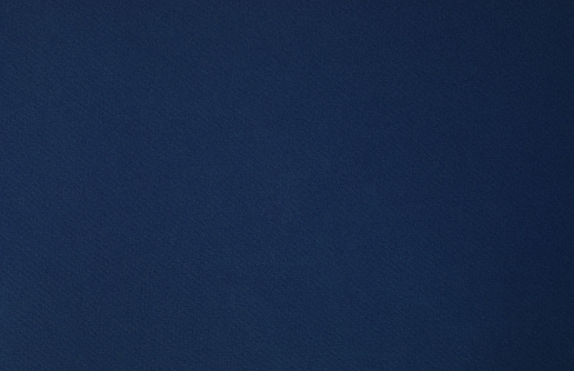 Navy blue paper background.