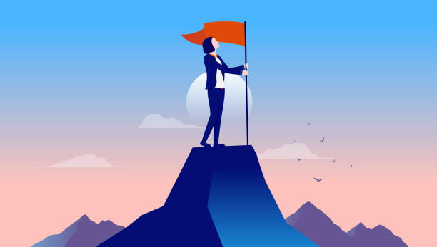 istock Businesswoman on mountaintop with flag 1470786868