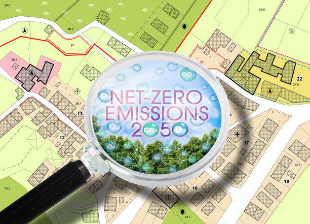 istock CO2 Net-Zero Emission 2050 and Carbon Neutrality concept with imaginary city map and magnifying glass 1470788471