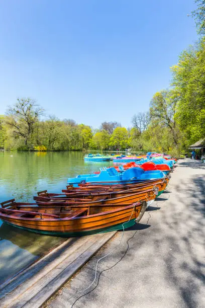 boats for rent at the  Seehaus in Munich, Germany. This pier is placed at the Kleinhesseloher lake in the English Garden.