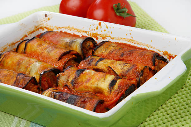istock Eggplant rolls filled with meat and vegetable in tomato sauce 147079184