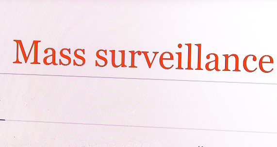 close up photo of the words mass surveillance