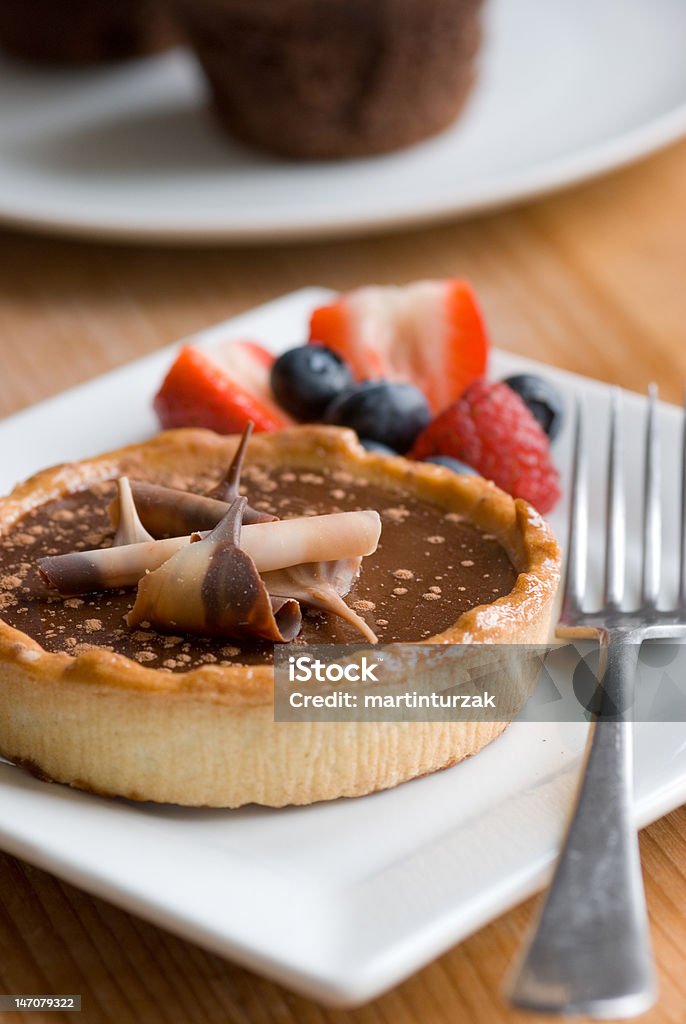 Chocolate and caramel tart Chocolate and caramel tart with fresh fruit Chocolate Cake Stock Photo