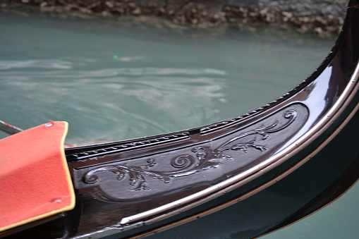 black gondola with decorations in Venice