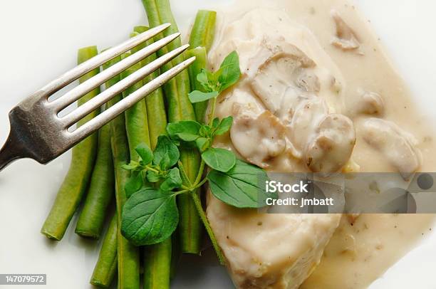 Chicken Breast Marinated In Mushroom Sauce With Green Beans Stock Photo - Download Image Now