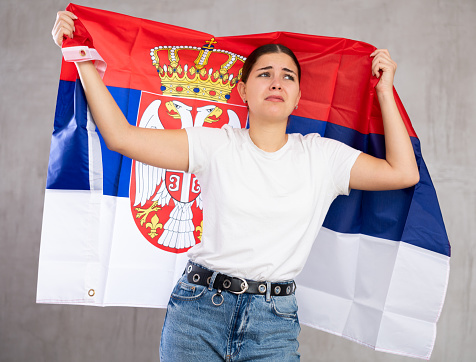 Female fan of Serbia team are upset by oss of their favorite team and express negative emotions