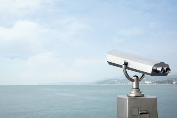 istock Metal tower viewer installed near sea, space for text. Mounted binoculars 1470798411