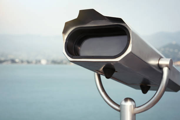 istock Metal tower viewer installed near sea, space for text. Mounted binoculars 1470798431