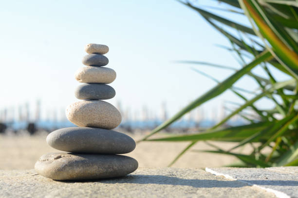 istock Stack of stones on parapet near sea, space for text 1470800030