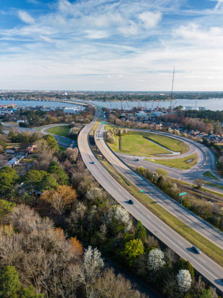 istock Interstate Daylight - Cars Traveling on Highway - Exit and Entrance 1470803603