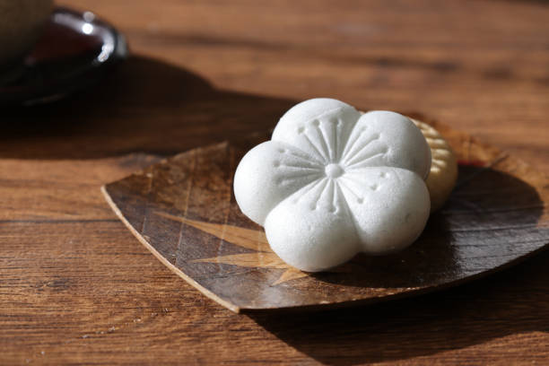 istock Bean jam filled wafers called Monaka on a plate on a wooden table. 1470804518