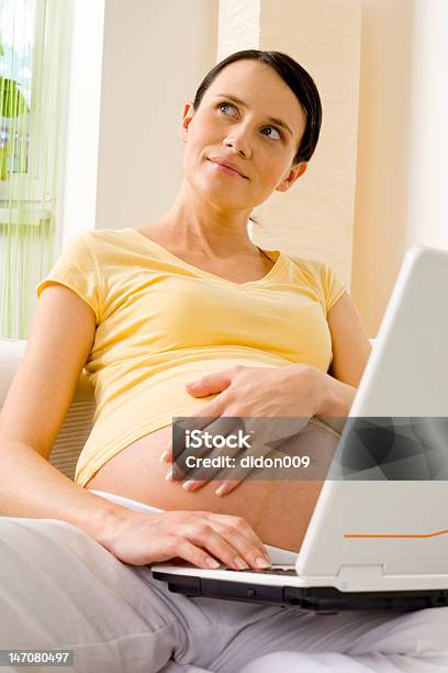 Young Pregnant Woman With Laptop Stock Photo - Download Image Now - Abdomen, Adult, Adults Only