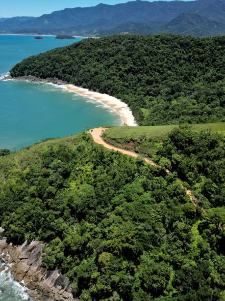 istock View from above paradise beach with blue mountains and water. 1470805459
