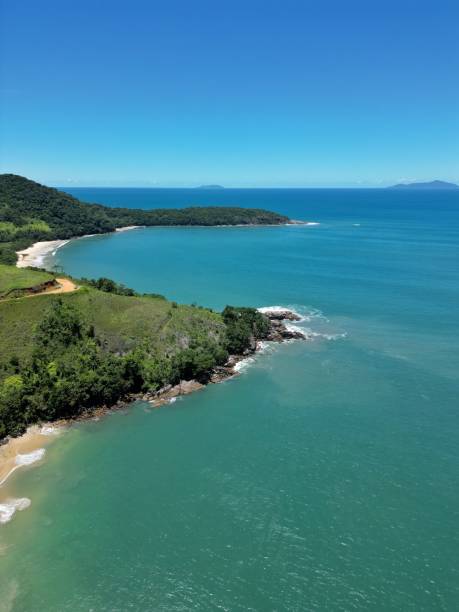 istock View from above paradise beach with blue mountains and water. 1470805502