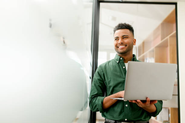 istock A confident male entrepreneur, dressed casually in a modern home office 1470808154
