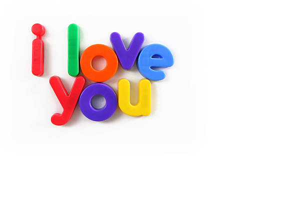 i love you i love you colored fridge magnets on white background magnetic letter stock pictures, royalty-free photos & images