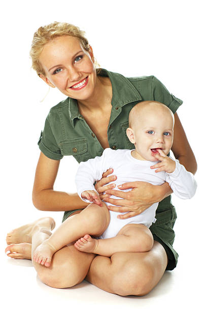 istock happy young mother holding her baby boy 147080899