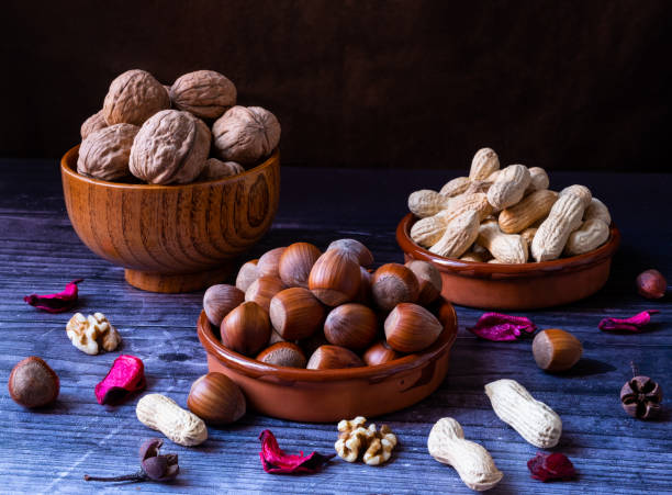 istock Set of healthy nuts, peanuts, hazelnuts and walnuts 1470809293