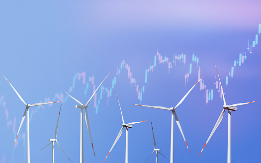Energy prices rising concepts. Many wind turbine with financial charts and graphs. Wind turbines with financial graphs, analyzing data of power and energy prices. Financial and economic growth in energy costs