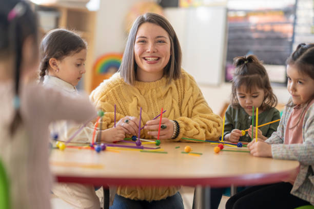 istock Kindergarten Students with Their Teacher 1470810740
