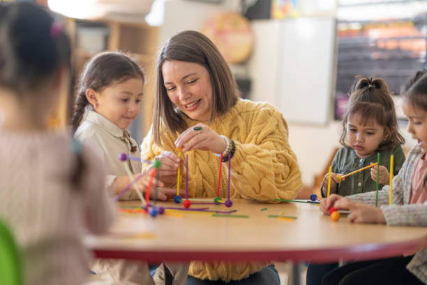 istock Kindergarten Students with Their Teacher 1470810744