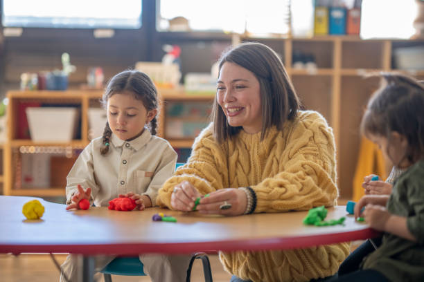 istock Kindergarten Students with Their Teacher 1470810747