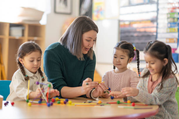 istock Kindergarten Students with Their Teacher 1470810774